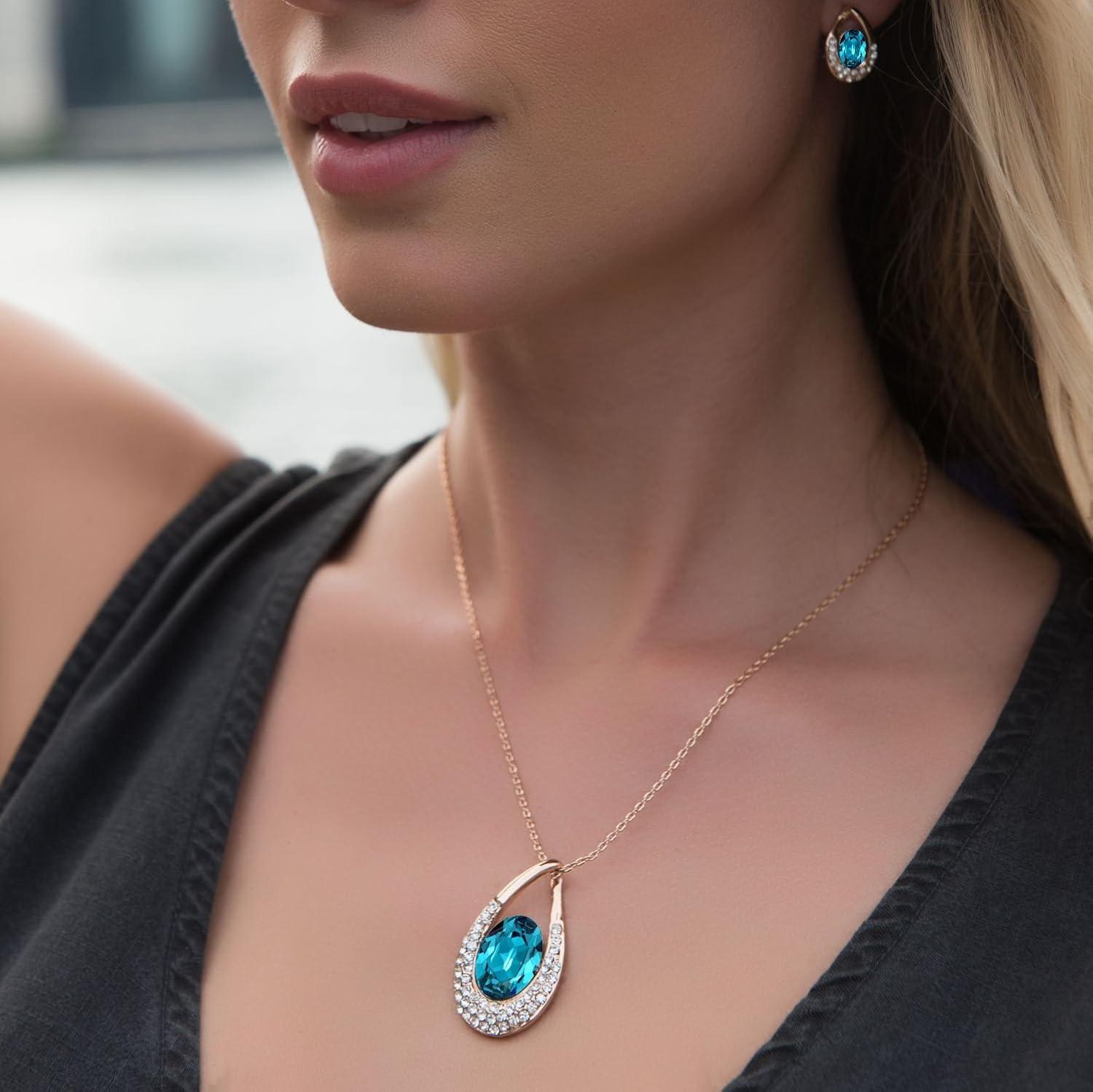 imagePresented by Miss New York Leafael Angels Teardrop Made with Premium Crystals Blue Zircon Jewelry Set Earrings Necklace 18 2 NickelLeadAllergy Free Luxury Gift BoxBlue Main CrystalRose Goldtone Chain