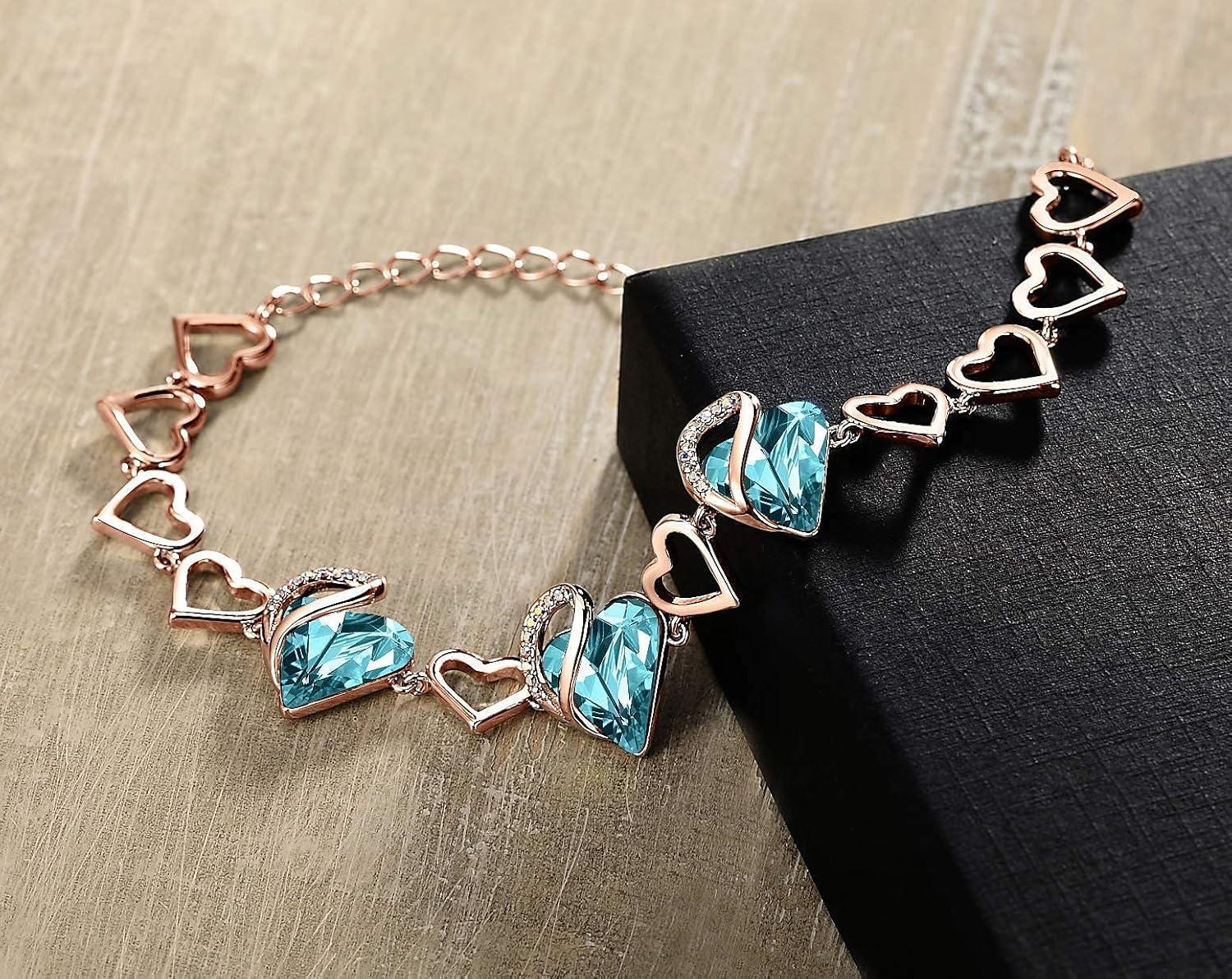 imageLeafael Infinity Love Crystal Heart Bundle Jewelry Set with Topaz Light Blue Healing Stone Crystal for Clear Mind Gifts for Women Necklace Earrings Bracelet 18K Rose Gold Plated