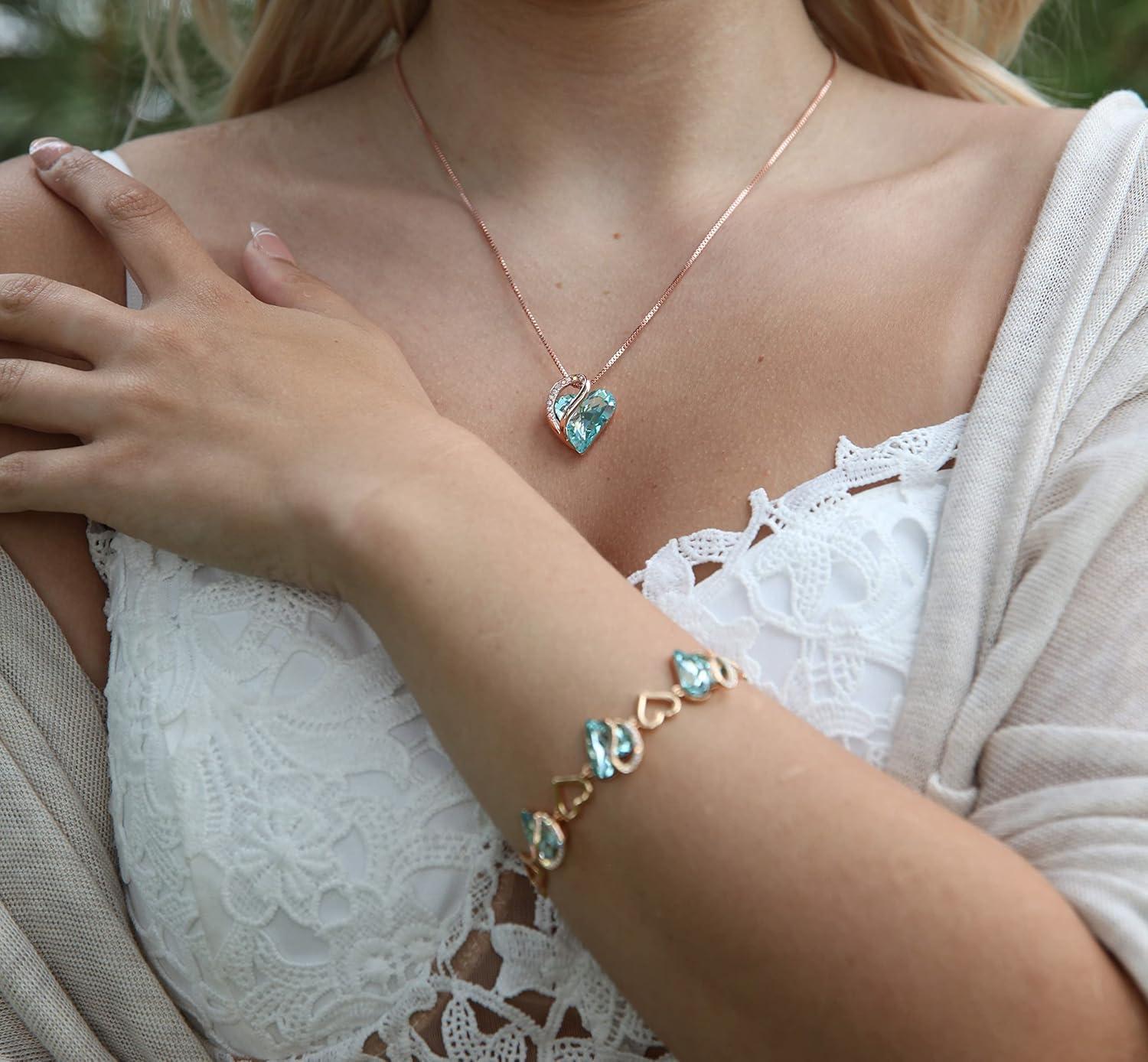 imageLeafael Infinity Love Crystal Heart Bundle Jewelry Set with Topaz Light Blue Healing Stone Crystal for Clear Mind Gifts for Women Necklace Earrings Bracelet 18K Rose Gold Plated